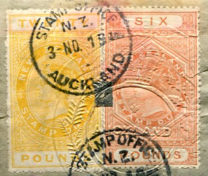 � + � />

<h4>Metal foil ties</h4>

<p>
The revenue stamps were often used on legal documents and
joined by metal foil ties.
This is shown in the examples.
</p>
<p>
In one, a twenty pound and a six pound
stamp are tied together with a metal foil
while in the other there are 4 stamps: �0, �, � and a QV pictorial 5/-.
</p>


<h4>Papers</h4>
<p>
The papers are the same as for the postage issues
with the changes occurring at the same time.
From 1913 the stamps were on chalk surfaced paper and the colours
are brighter.
However, the basic colour of all values remained the same during the 51 years.
</p>
<br class = 